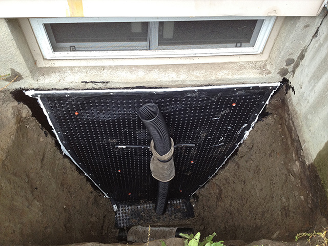 window-well-before-stone